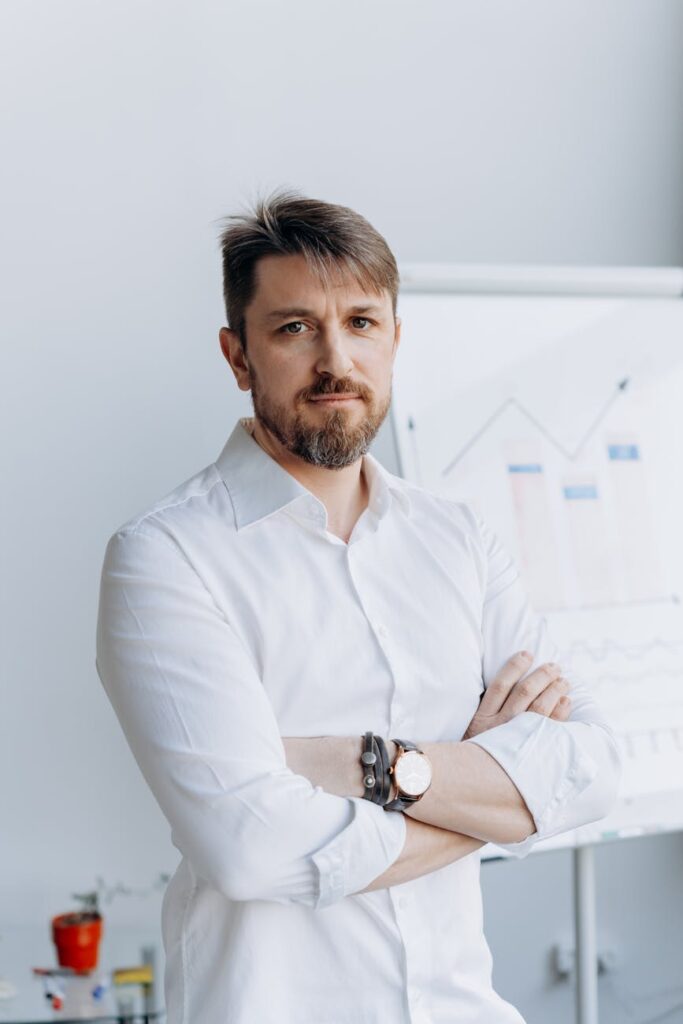 a businessman wearing white long sleeves
